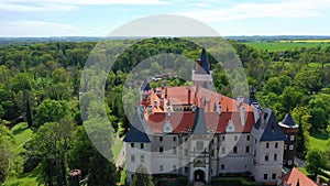 Aerial view of Zleby castle in Central Bohemian region, Czech Republic. The original Zleby castle was rebuilt in Neo-Gothic style