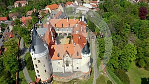 Aerial view of Zleby castle in Central Bohemian region, Czech Republic. The original Zleby castle was rebuilt in Neo-Gothic style