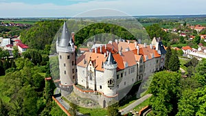 Aerial view of Zleby castle in Central Bohemian region, Czech Republic. The original Zleby castle was rebuilt in Neo-Gothic style