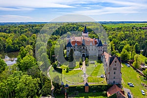 Aerial view of Zleby castle in Central Bohemian region, Czech Republic. The original Zleby castle was rebuilt in Neo-Gothic style