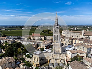 Aerial views of green vineyards, old houses and streets of medieval town St. Emilion, production of red Bordeaux wine on cru class