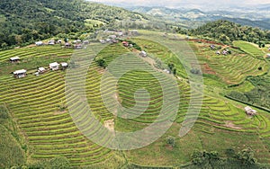 Aerial views of Small house and rice terraces field at pabongpaing village rice terraces Mae-Jam Chiang mai, Thailand.