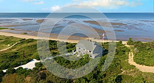 Aerial at Wellfleet, Cape Cod Showing a House on the Coast of the Bay at Low Tide