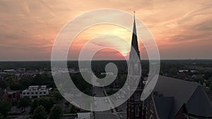 Aerial wide footage of old temple or catholic church in countryside. Naperville in evening time.