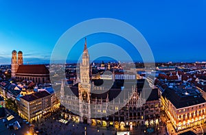 Aerial wide panorama of The New Town Hall and Marienplatz at night, Munich, Germany