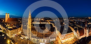 Aerial wide panorama of The New Town Hall and Marienplatz at night, Munich, Germany