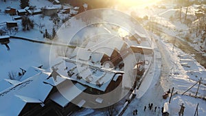 Aerial winter nature nordic landscape snowy mountain forest on sunset