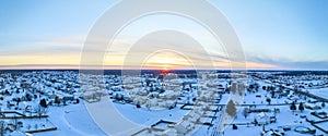 Aerial Winter Sunset Over Snowy Suburban Grid, Panorama