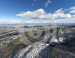 Aerial Winter view of Vitosha Mountain and city of Sofia, Bulgaria