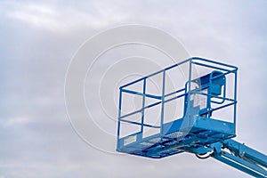 Aerial work platform against cloudy sky in Utah