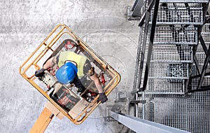 Aerial of a worker on a cherry picker photo