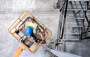 Aerial of a worker on a cherry picker