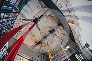 Aerial workshop in abandoned warehouse