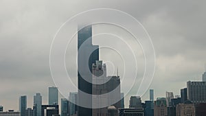 Aerial zoom view Chicago on a foggy day. Cloudy day in downtown Chicago Illinois, skyscrapers and business centers of