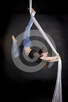 Aerialist doing tricks on silks