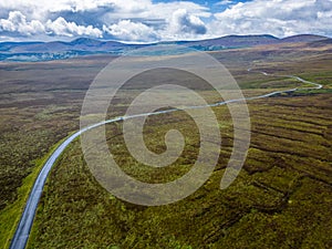 Aerialview of Road, Bogs with mountains in background in Sally gap