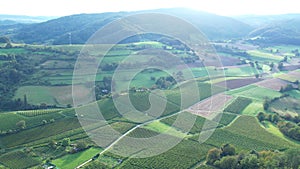 An aerian view of fields in mountains photo