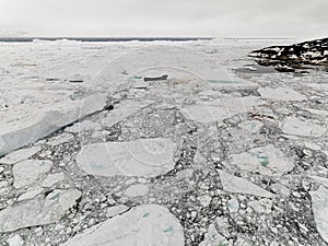 Aeriel view of the huge icebergs in Greenland