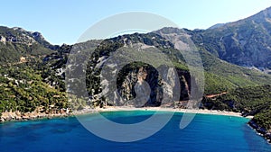 Aero. top view. beautiful summer seascape. Rocky beaches of Evia island, Greece. sea bay with turquoise, blue water at