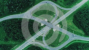 Aero top view of highway highway road. Landscape of suburb field with track and trees