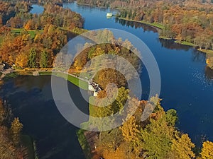 Aero view of the Park in autumn. Lake and forest view from above. Gatchina. Russia