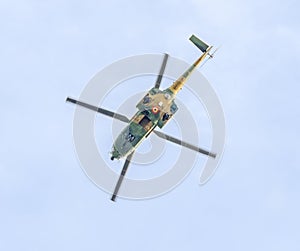 Aerobatic elicopter pilots training in the sky of the city. Puma elicopter, navy, army drill