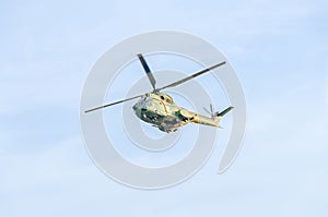 Aerobatic elicopter pilots training in the sky of the city. Puma elicopter, navy, army drill