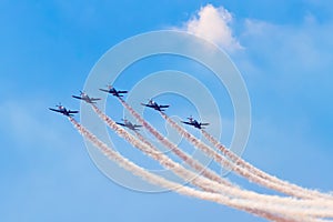Aerobatic group on the airshow with smoke