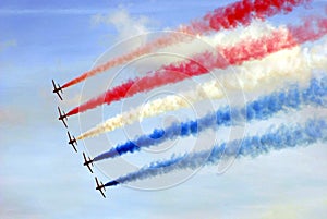 Aerobatic team. aeroplanes flying in a show