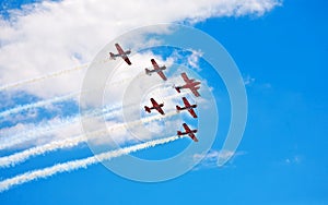 Aerobatic team making loopings in the air