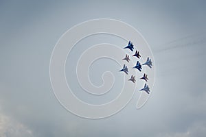 Aerobatics group of fighters photo