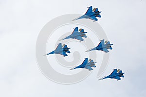 Aerobatics performed by aviation group of aerobatics Military-air forces Russian Knights on planes Su-27