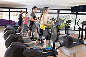 Aerobics elliptical walker trainer group at gym