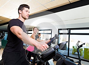 Aerobics elliptical walker trainer group at gym