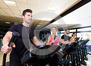 Aerobics elliptical walker trainer group at gym