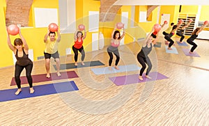 Aerobics pilates class with yoga balls