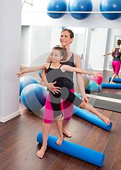 Aerobics woman personal trainer of children girl