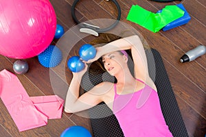 Aerobics woman tired resting lying on mat