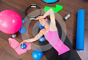 Aerobics woman tired resting lying on mat