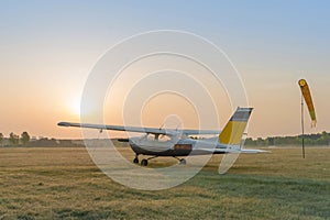 The aerodrome with small aircraft at dawn