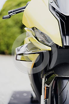 Aerodynamic flaps or wings on a modern sports motorcycle photo