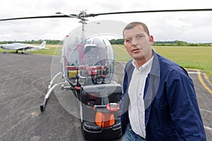 aeronautic technician hauling helicopter