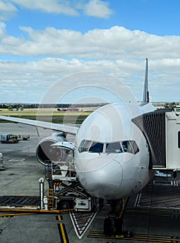 Aeroplane at arrival terminal aerobridge