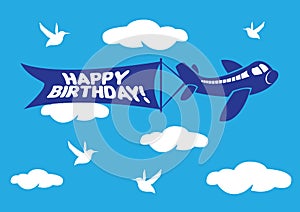 Aeroplane with birthday flying message banner.