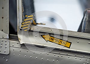 Aeroplane jet rescue pilots canopy release with yellow arrow and text pointing to pull cord