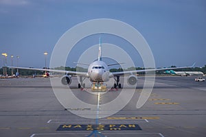 Aeroplane on sky with condensation trails