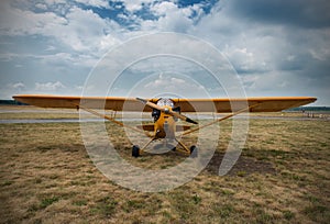 Aeroplane waiting for a start, on grass