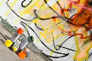 Aerosol paint and graffiti painted wall photo