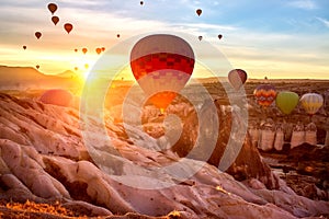 Aerostat and sunset in the mountains of Cappadocia. Turkey