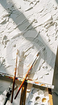 Aesthetic chaos. Easel, rough strokes of paint, opened paint tubes, brushes, white pastel colour palette. Generative AI